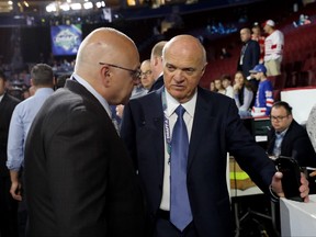 Barry Trotz (left) and Lou Lamoriello of the New Your Islanders attend the 2019 NHL draft.