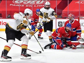 Defenceman Shea Weber and goalkeeper Carey Price come together in the Canadiens goal crease as they attempt to block a shot from Vegas’ Matthias Janmark during the final game of their semifinal series at the Bell Centre.