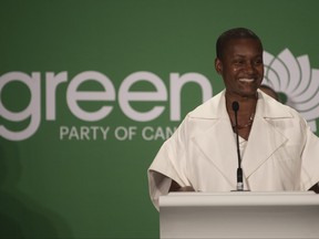 New Green party leader Annamie Paul smiles as she speaks at the party leadership announcement in Ottawa, Oct. 3, 2020.