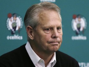 In this May 17, 2016, file photo, Boston Celtics president Danny Ainge pauses while answering a reporter's question at the basketball team's training facility in Waltham, Mass.