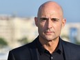 Mark Strong, cast from the thriller TV series "Deep State," poses for a photograph during the MIPCOM trade show in Cannes, southern France, on Oct. 16, 2017.