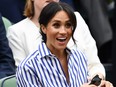 LONDON, ENGLAND - JULY 14: Catherine, Duchess of Cambridge and Meghan, Duchess of Sussex attend day twelve of the Wimbledon Lawn Tennis Championships at All England Lawn Tennis and Croquet Club on July 14, 2018 in London, England. (Photo by Clive Mason/Getty Images)