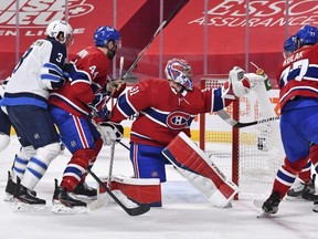 Montreal goaltender Carey Price makes a glove save against the Jets last night.  Getty Images