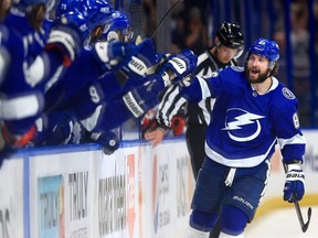 Lightning forward Nikita Kucherov celebrates a third period goal against the Hurricanes during Game 4 of the second round of the 2021 Stanley Cup Playoffs at Amalie Arena in Tampa, Fla., Saturday, June 5, 2021.