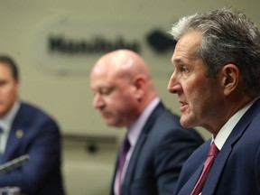 Premier Brian Pallister (right) and Dr. Brent Roussin address the media during a COVID-19 pandemic media briefing at the Manitoba Legislative Building March 17, 2020. Kevin King/Winnipeg Sun/Postmedia Network