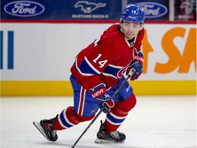 Montreal Canadiens' Nick Suzuki follows the play during first period against the Winnipeg Jets in Montreal on April 8, 2021.