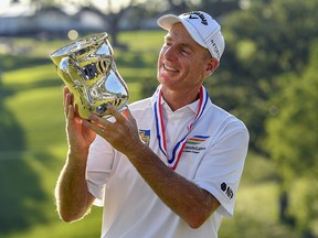 Jim Furyk poses with the trophy after winning the U.S. Senior Open Championship at the Omaha Country Club on July 11, 2021 in Omaha, Nebraska.