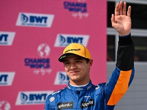 Lando Norris celebrates on the podium after the Austrian Grand Prix at the Red Bull Ring race track in Spielberg, Austria, on July 4, 2021.