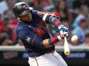 Nelson Cruz hits against the Detroit Tigers at Target Field on July 9, 2021 in Minneapolis.