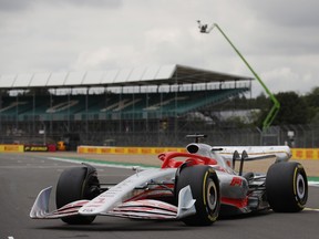 The new 2022 F1 car is unveiled during a promotional photoshoot Thursday at at Silverstone.