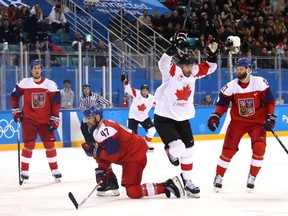 Canada's Chris Kelly, second from right, celebrates after scoring in the third period against Czech Republic during the Men's Bronze Medal Game at the PyeongChang Winter Olympics, in Gangneung, South Korea, Feb. 24, 2018.