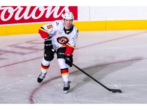 Colton Poolman, now in his first campaign with the Calgary Flames' farm team, is hoping to join his older brother Tucker at the NHL level. (Courtesy of Stockton Heat)