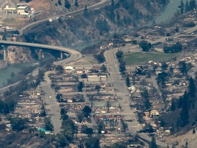 Structures destroyed by wildfire are seen in Lytton, B.C., on Thursday, July 1, 2021.