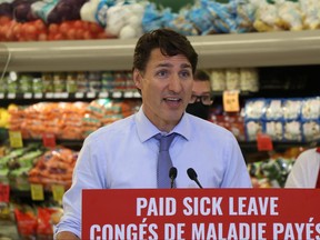 Liberal leader Justin Trudeau makes a campaign stop at Food Fare in Winnipeg to announce changes to sick leave and promises for $110 million to upgrade ventilation in schools on Friday, Aug. 20, 2021.