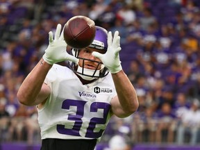 Cameron Smith of the Minnesota Vikings catches the ball during practice at U.S. Bank Stadium on August 07, 2021 in Minneapolis, Minnesota.