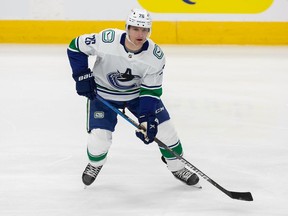 Antoine Roussel of the Vancouver Canucks skates against the Edmonton Oilers at Rogers Place on Jan. 14, 2021 in Edmonton, Canada.