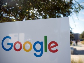 In this file photo taken on Nov. 4, 2016 the Google sign and logo is pictured at the Googleplex in Menlo Park, Calif.