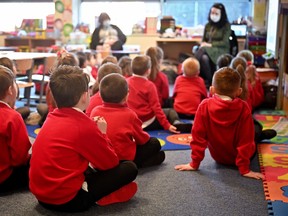Pupils at Cleeves Primary School return to the classroom on February 22, 2021 in Glasgow, Scotland.