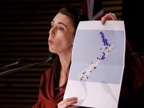 New Zealand Prime Minister Jacinda Ardern talks to the media at the COVID-19 update and Post Cabinet press conference at the Beehive Theatrette in Wellington, Monday, Aug. 23, 2021.