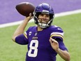 Vikings quarterback Kirk Cousins throws a pass during the first half against the Panthers at U.S. Bank Stadium in Minneapolis, Nov. 29, 2020.