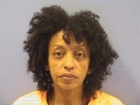 Mugshot of Mouheb Ashakih, of Sandusky, Ohio, who allegedly left her dog in a hot car as punishment.