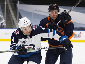 The Winnipeg Jets have resigned defenceman Neal Pionk.