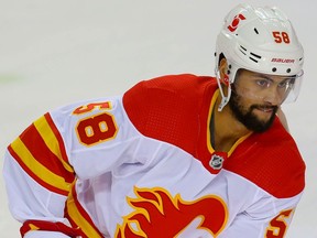 Calgary Flames Oliver Kylington during warm-up before an intrasquad game at NHL training camp in Calgary on Monday January 11, 2021. Al Charest / Postmedia