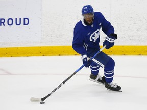 Toronto Maple Leafs forward Wayne Simmonds wheels around on the ice at their practice facility.