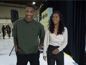 Leylah Annie Fernandez makes a joke about "having to make herself taller" as she walks beside Félix Auger-Aliassime at a news conference in Dorval on Tuesday, September 14, 2021, a few days after their participation in the U.S. Open Tennis tournament.