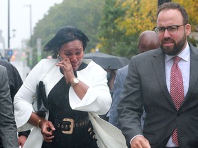 Joined by her lawyers, Aissatou Diallo leaves the Ottawa courthouse after being acquitted of all charges in relation to the Westboro bus crash.