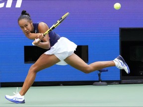 Leylah Fernandez hits a backhand against Emma Raducanu in the women's singles final of the 2021 U.S. Open tennis tournament in New York.