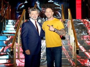 Andy Serkis and Tom Hardy attend the fan screening of Venom: Let There Be Carnage at Cineworld Leicester Square on Sept. 14, 2021 in London.