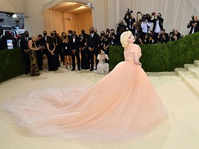 US singer/songwriter Billie Eilish arrives for the 2021 Met Gala at the Metropolitan Museum of Art on September 13, 2021 in New York. - This year's Met Gala has a distinctively youthful imprint, hosted by singer Billie Eilish, actor Timothee Chalamet, poet Amanda Gorman and tennis star Naomi Osaka, none of them older than 25. The 2021 theme is "In America: A Lexicon of Fashion." (Photo by ANGELA WEISS / AFP) (Photo by ANGELA WEISS/AFP via Getty Images)