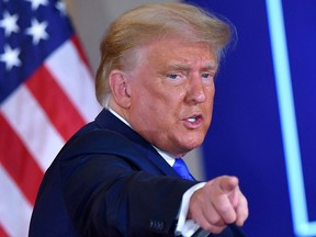 In this file photo former U.S. President Donald Trump gestures after speaking during election night in the East Room of the White House in Washington on Nov. 4, 2020.