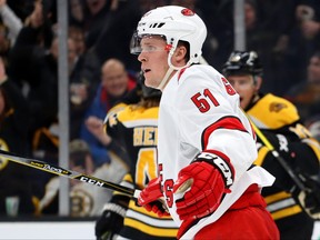 Jake Gardiner of the Carolina Hurricanes reacts after Charlie Coyle of the Boston Bruins scored a goal during the third period at TD Garden on Dec. 3, 2019 in Boston.
