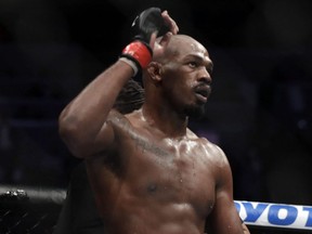 Jon Jones celebrates after defeating Anthony Smith following their light heavyweight title bout during UFC 235 at T-Mobile Arena in Las Vegas, March 2, 2019.