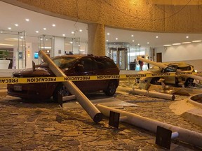 View of damaged cars outside a hotel after an earthquake in Acapulco, Mexico, Tuesday, Sept. 7, 2021.