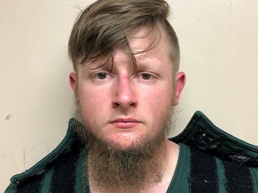 Robert Aaron Long poses in a jail booking photo after he was taken into custody by the Crisp County Sheriff's Office in Cordele, Georgia, March 16, 2021.