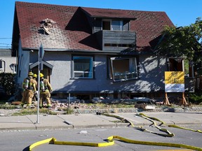 Calgary firefighters deal with a gas explosion in a home on the 800 block of 1st Avenue N.E. in Bridgeland on Tuesday, September 7, 2021. The explosion appeared to lift the home off its foundations and sent glass and debris flying across across adjacent streets.