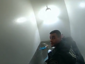 NYPD officers try to save family after flood waters take over basement apartment.