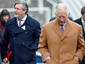 Prince Charles, Prince of Wales, and his aide Michael Fawcett are pictured at Ascot Racecourse on Nov. 23, 2018 in Ascot, England.