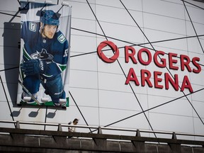 The Canucks have said that fans as well as staff will have to show proof of vaccination to enter Rogers Arena (above) and the Abbotsford Centre. That policy does not cover the players, whose workplace conditions must be negotiated with the NHL under their collective bargaining agreement.