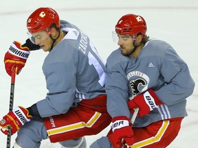 Calgary Flames Nikita Zadorov and Christopher Tanev during 2021 NHL training camp in Calgary on Friday, September 24, 2021. Al Charest / Postmedia