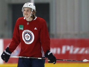 Sami Niku laughs during Winnipeg Jets practice at Bell MTS Iceplex on Tues., Nov. 13, 2018.