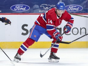 Montreal Canadiens' Nick Suzuki passes the puck during third period against the Edmonton Oilers in Montreal on May 10, 2021.