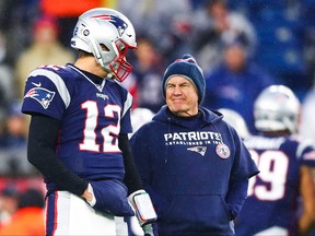 Buccaneers quarterback Tom Brady (left) has a chance to break the career passing record against his former coach Bill Belichick and the Patriots today.