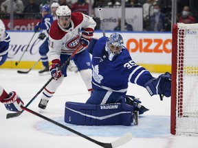 Maple Leafs goaltender Petr Mrazek (35) defends the goal as Montreal Canadiens forward Brendan Gallagher (11) waits for a pass during the second period at Scotiabank Arena.