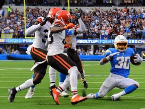 Los Angeles Chargers running back Austin Ekeler gives himself up short of the Cleveland end zone to use up time late in the game. No matter, the Browns defence all but escorted him over the goalline on the next play, but then ran out of time in their 47-42 loss.