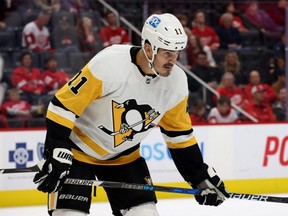 Brian Boyle of the Penguins looks on while playing the Red Wings in a pre-season game at Little Caesars Arena in Detroit, Thursday, Oct. 7, 2021.