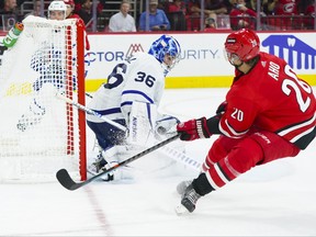Maple Leafs goaltender Jack Campbell stops a shot by Carolina Hurricanes' Sebastian Aho during the third period at PNC Arena on Monday, Oct. 25, 2021.